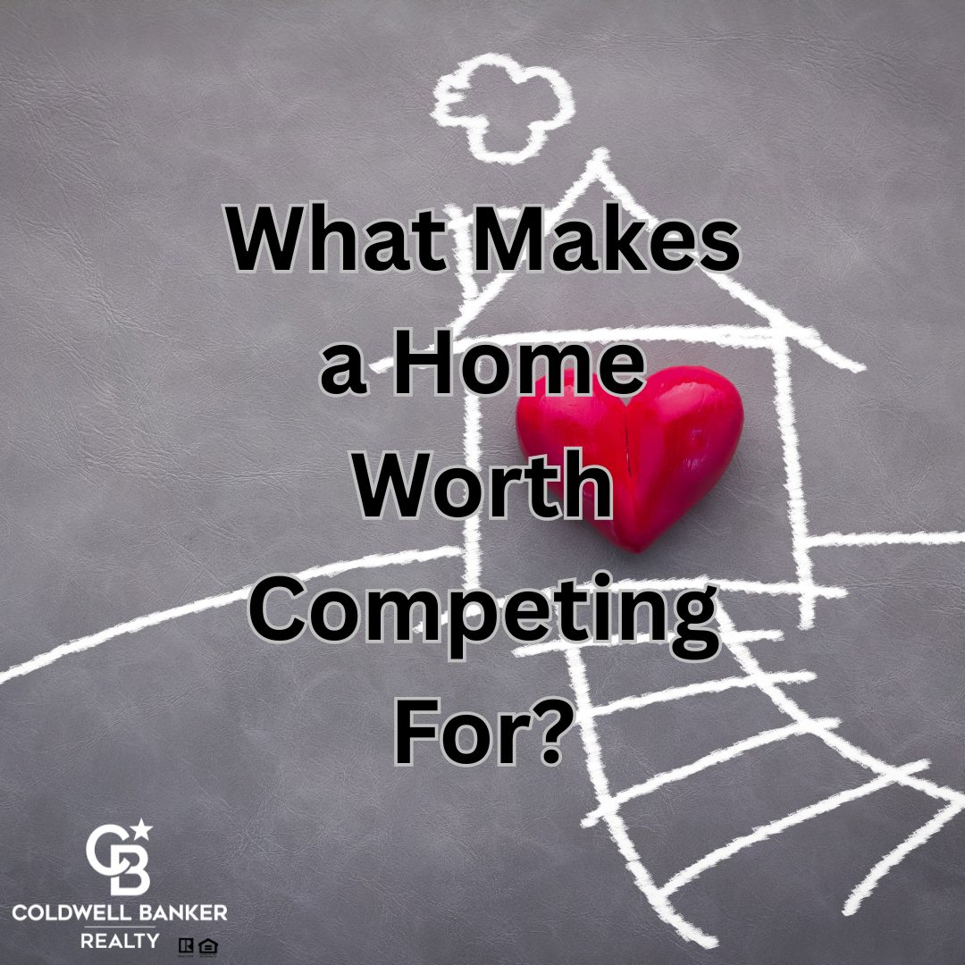 A chalk drawing of a house on a gray background with a red heart at the center. Text overlay reads “What Makes a Home Worth Competing For?” with the Coldwell Banker Realty logo in the corner.