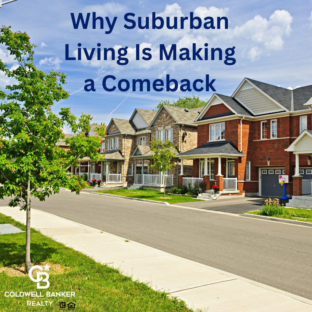 A sunny suburban street lined with modern two-story homes featuring porches, garages, and green lawns, representing comfortable suburban living in Cincinnati.