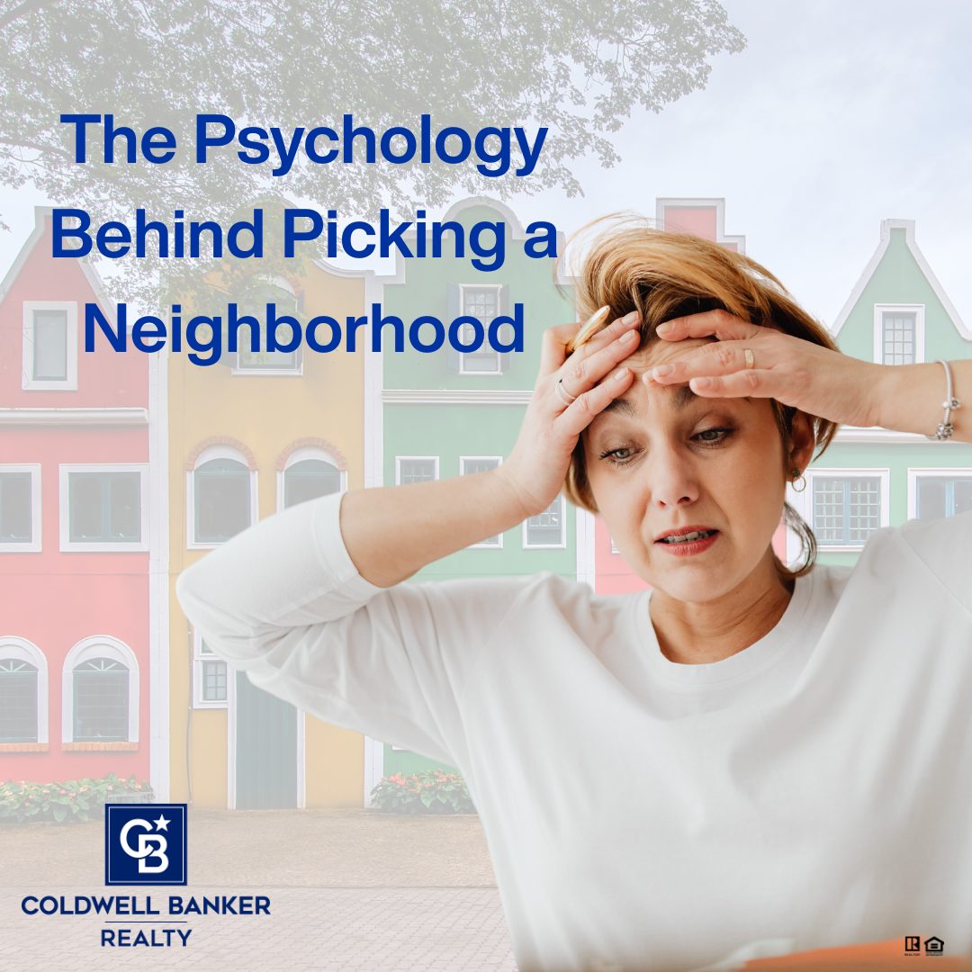 Stressed homebuyer holding her head while trying to choose the right neighborhood, with colorful houses in the background and Coldwell Banker Realty branding.